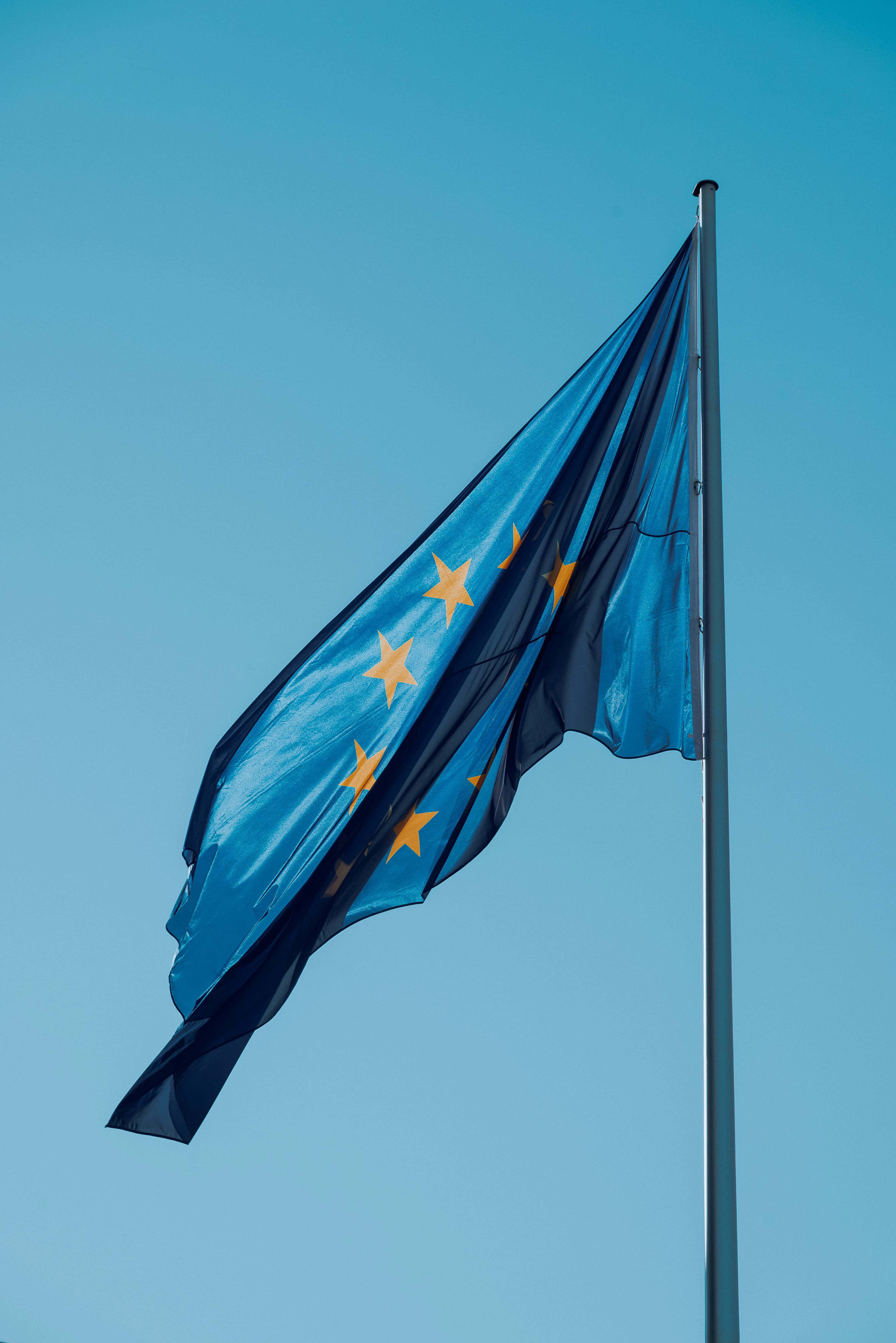 European Union flag flying against a clear sky