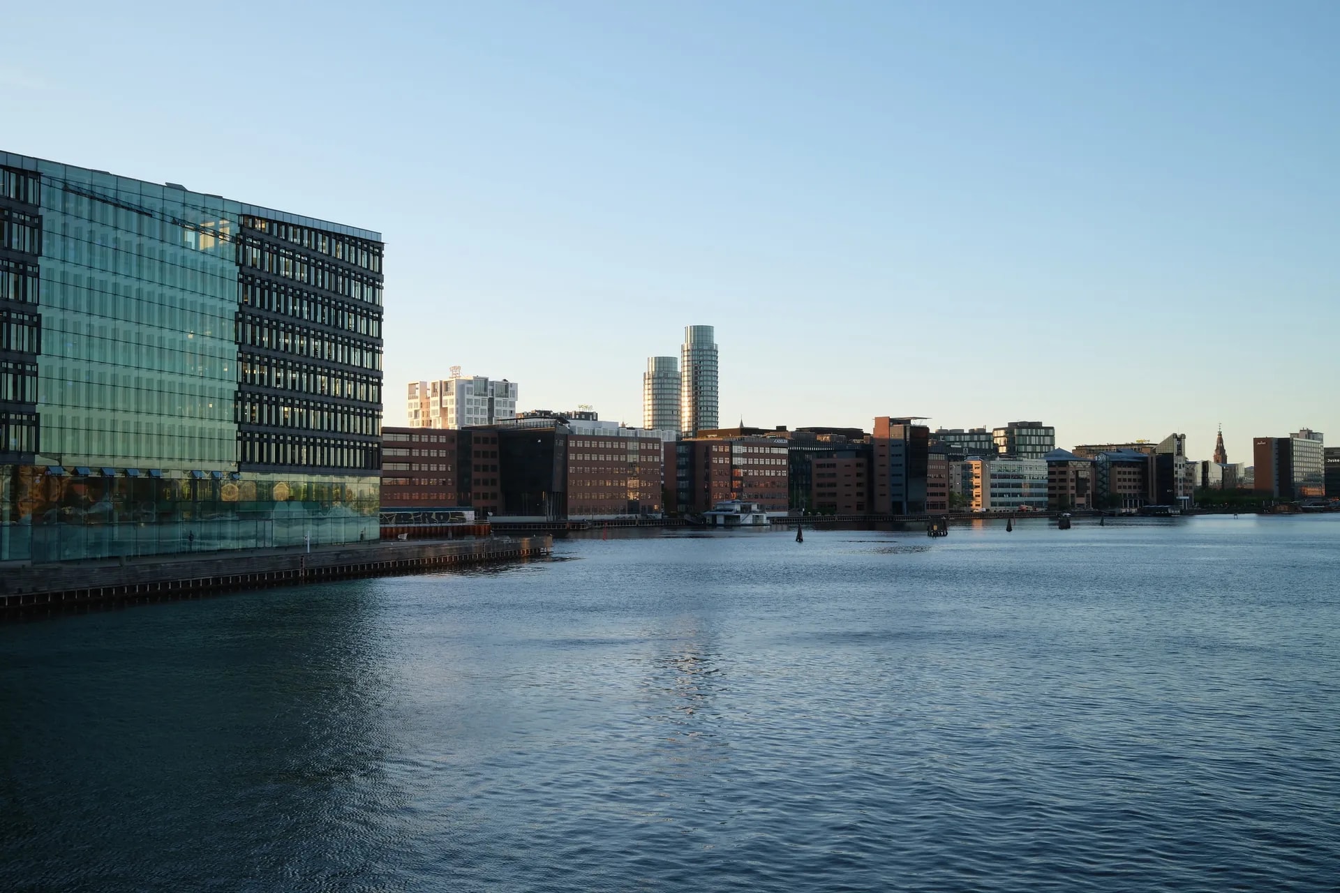 Glass office facade on the Copenhagen harbour at evening
